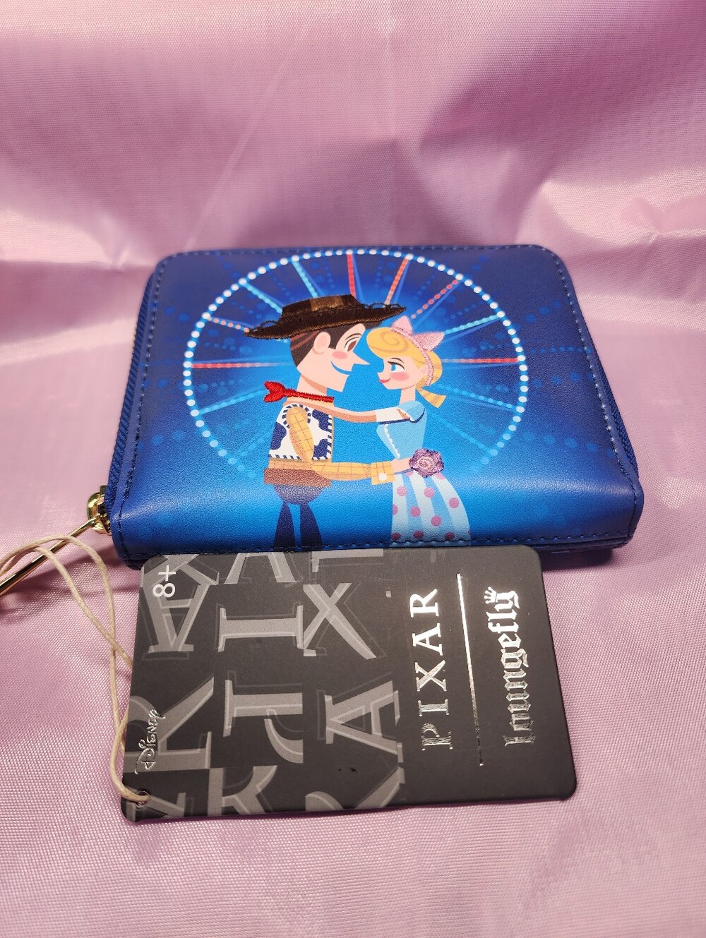 This Loungefly Disney Pixar Toy Story Woody Bo Peep wallet.  NWT